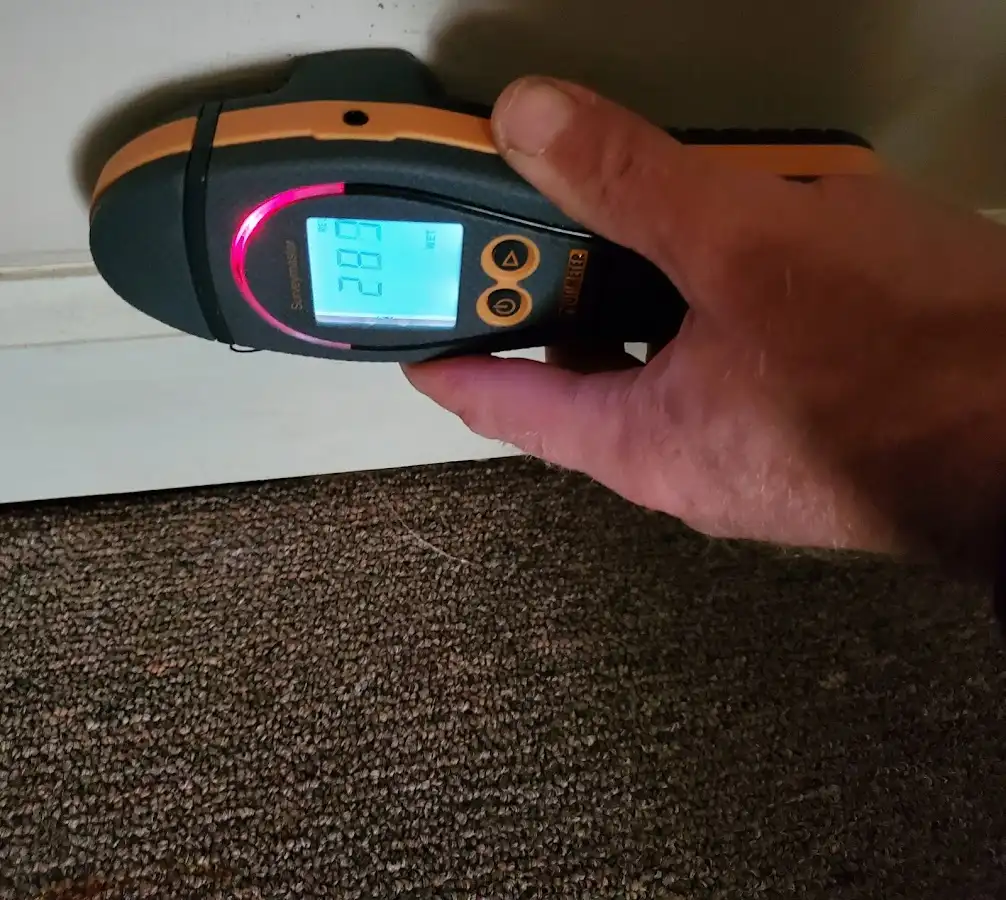 Moisture detection at baseboard during Burst Pipe Cleanup in Coral Springs